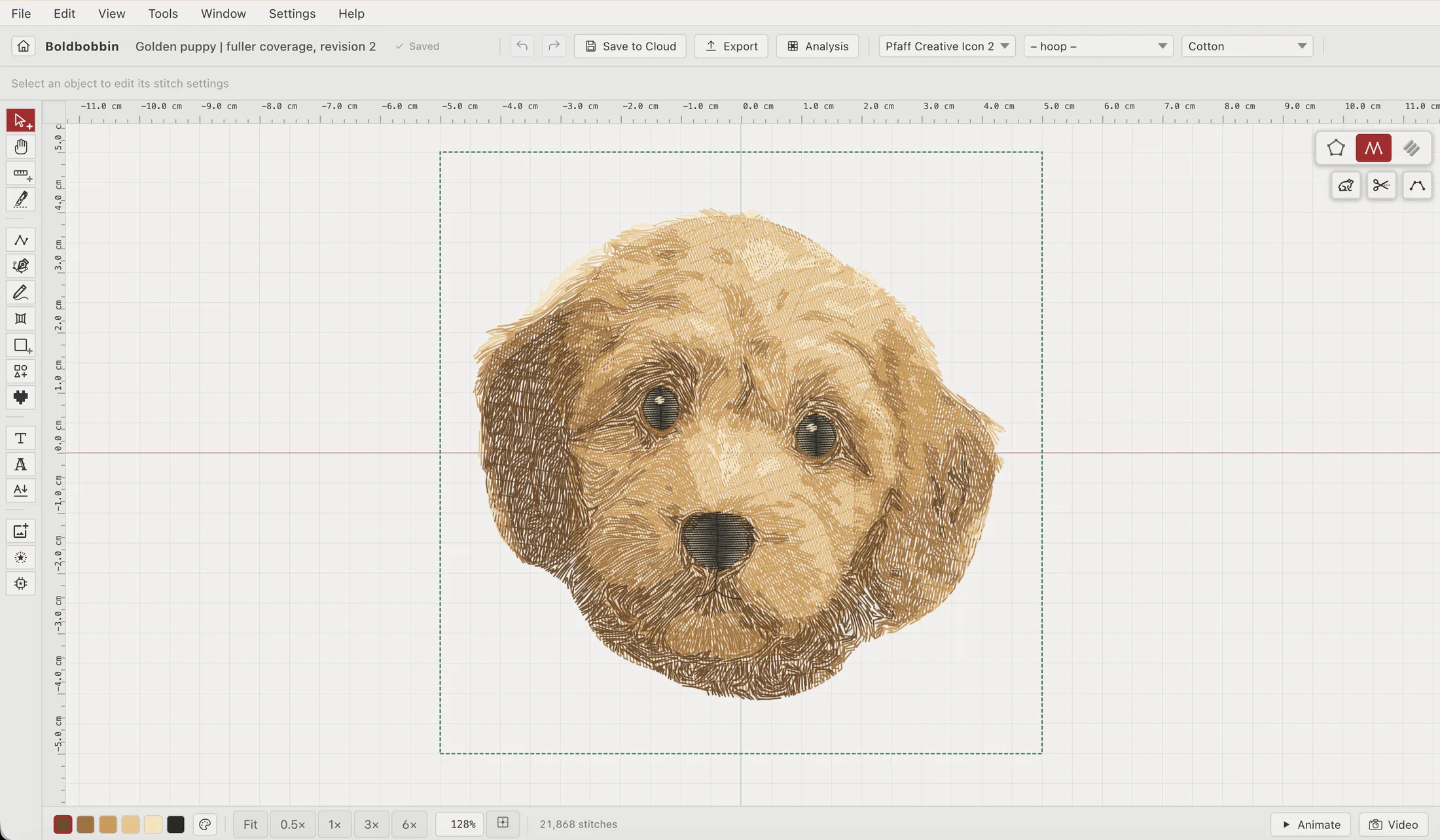 The Boldbobbin editor with the Golden puppy design open: a puppy's face in shades of gold and brown, shown in the stitch preview.
